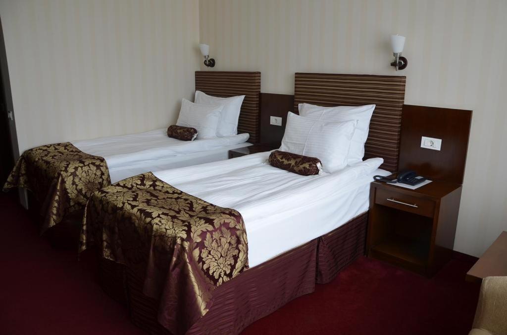 Двухместный (Двухместный номер эконом-класса с 2 отдельными кроватями) отеля Grand Hotel Napoca, Клуж-Напока