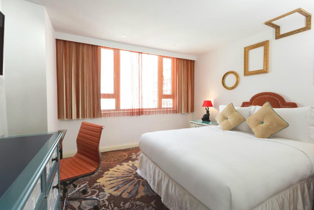Двухместный (Улучшенный двухместный номер с 1 кроватью или 2 отдельными кроватями) отеля The Luxe Manor, Гонконг (город)