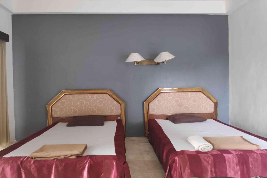 Двухместный (Двухместный номер Делюкс с 2 отдельными кроватями) отеля Pecatu Guest House & Hostel, Улувату