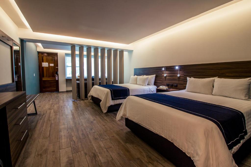 Сьюит (Полулюкс с 2 двуспальными кроватями) отеля Mision De Los Angeles, Оахака-де-Хуарес