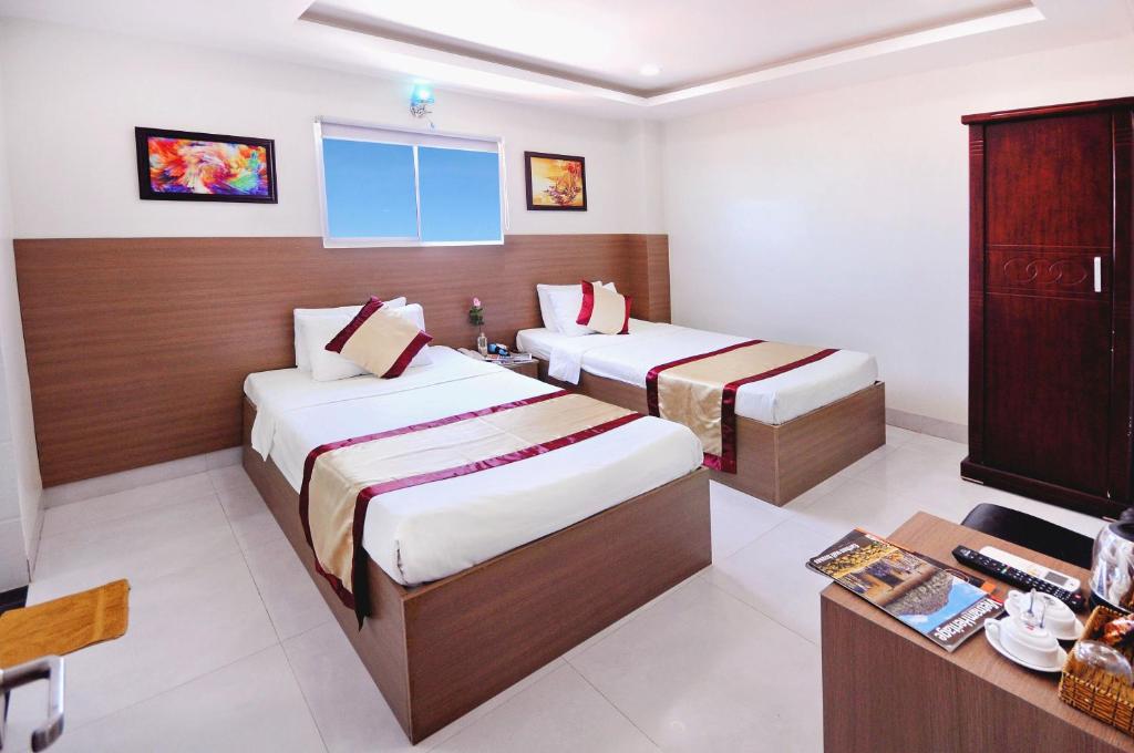 Двухместный (Двухместный номер Делюкс с 1 кроватью или 2 отдельными кроватями) отеля Arise Hotel Nha Trang, Нячанг