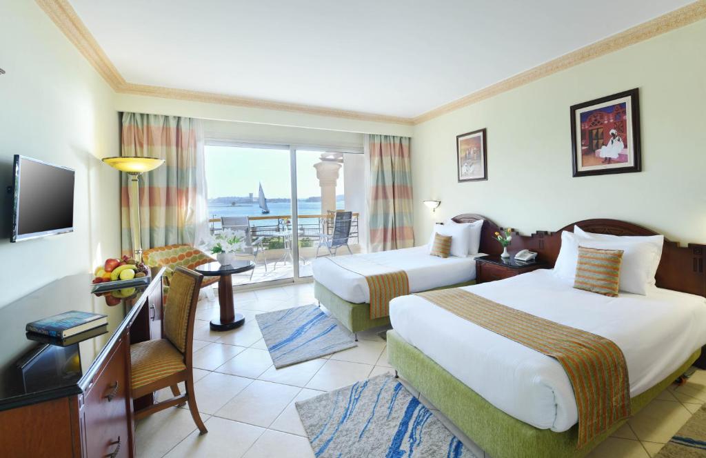 Двухместный (Двухместный номер Делюкс с 1 кроватью или 2 отдельными кроватями, а также видом на Нил) отеля Helnan Aswan Hotel - Convention Center, Асуан