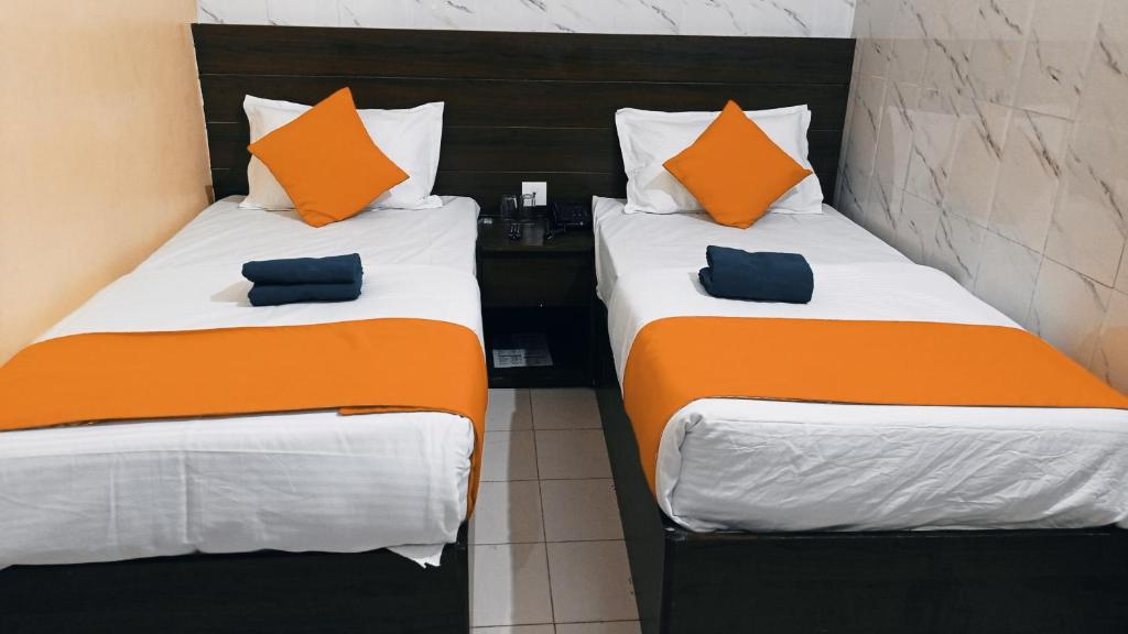 Двухместный (Двухместный номер с 2 отдельными кроватями) отеля Hotel Om palace, Джайпур