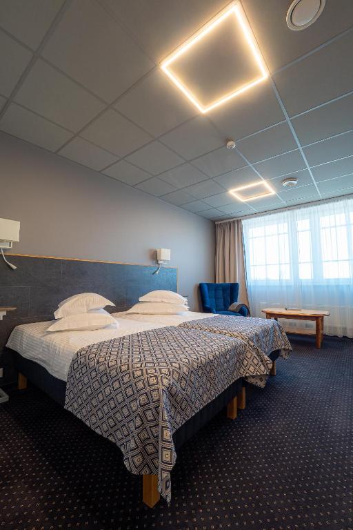 Двухместный (Двухместный номер Делюкс с 1 кроватью или 2 отдельными кроватями) отеля Centrum Hotel Viljandi, Вильянди