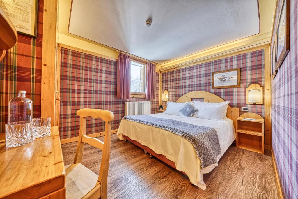 Двухместный (Двухместный номер с 1 кроватью или 2 отдельными кроватями) отеля Hotel Sant'Orso & Wellness Le Bois, Конье