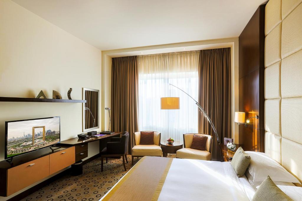 Сьюит (Представительский люкс — Скидка 20% на еду, напитки и услуги спа-центра. Доступ в сауну и паровую баню) отеля Asiana Hotel Dubai, Дубай