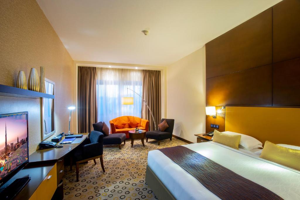 Двухместный (Улучшенный номер Делюкс — Скидка 20% на еду, напитки и услуги спа-центра. Доступ в сауну и паровую баню) отеля Asiana Hotel Dubai, Дубай