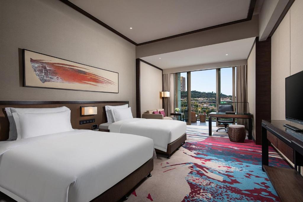Двухместный (Клубный двухместный номер с 2 отдельными кроватями) отеля Crowne Plaza Chongqing New North Zone, Чунцин