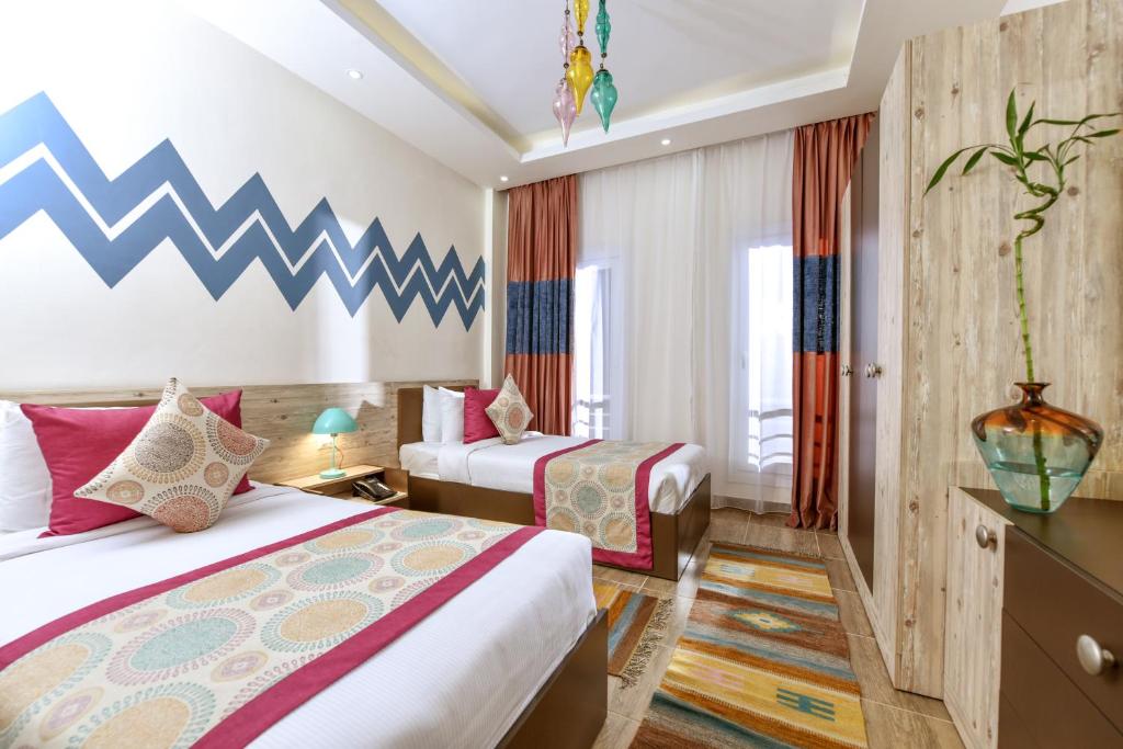 Номер (Шале с двумя спальнями) курортного отеля Tolip North Coast Hotel, Эль-Аламейн