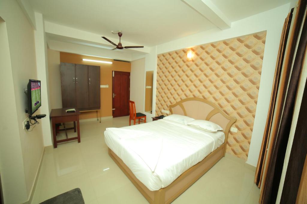 Двухместный (Стандартный двухместный номер с 1 кроватью и вентилятором) отеля Hotel Falcon, Тривандрум