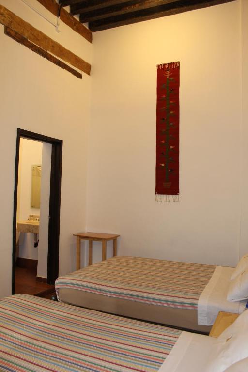 Двухместный (Двухместный номер с 2 двуспальными кроватями и собственной ванной комнатой) хостела Mexico City Hostel, Мехико