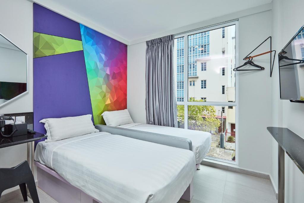 Двухместный (Улучшенный двухместный номер с 2 отдельными кроватями) отеля Fragrance Hotel - Sunflower, Сингапур (город)