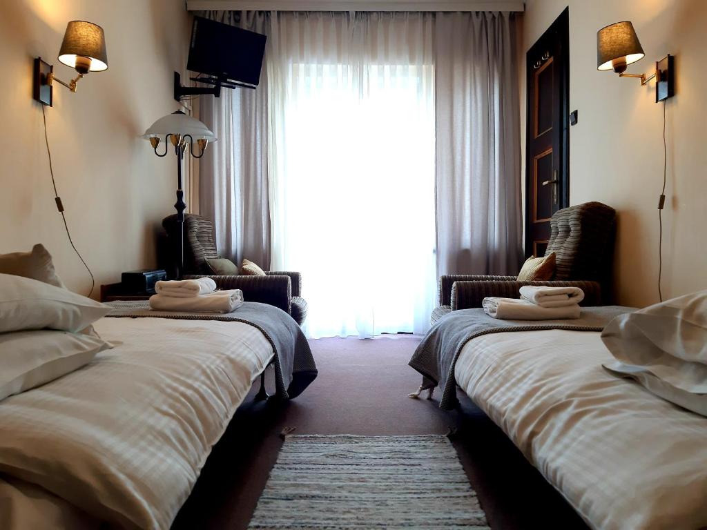 Двухместный (Стандартный двухместный номер с 2 отдельными кроватями) отеля Hotel Kasprowy Wierch, Закопане