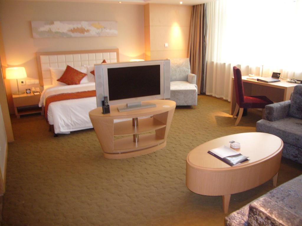 Двухместный (Двухместный номер Делюкс с 2 отдельными кроватями и видом на озеро) отеля Grand Metropark Hotel Suzhou, Сучжоу