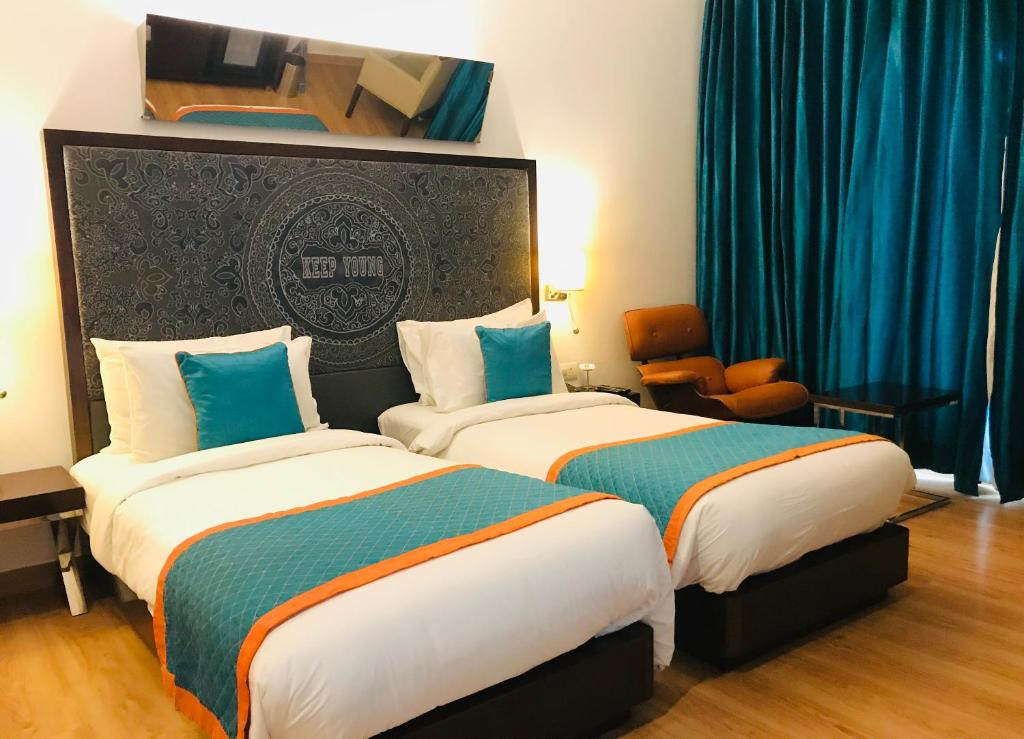 Двухместный (Улучшенный двухместный номер с 1 кроватью или 2 отдельными кроватями) отеля Golden Tulip Gurgaon Sector 29, Гургаон