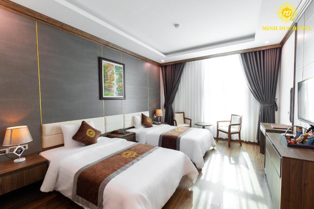 Двухместный (Двухместный номер с 2 отдельными кроватями и окном) отеля Minh Duc Hotel Hai Ha Quang Ninh, Куангнинь