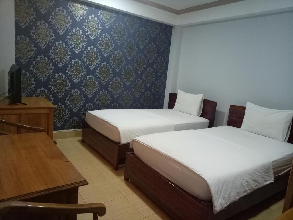 Двухместный (Двухместный номер с 2 отдельными кроватями) отеля Khách sạn Phú An, Камау