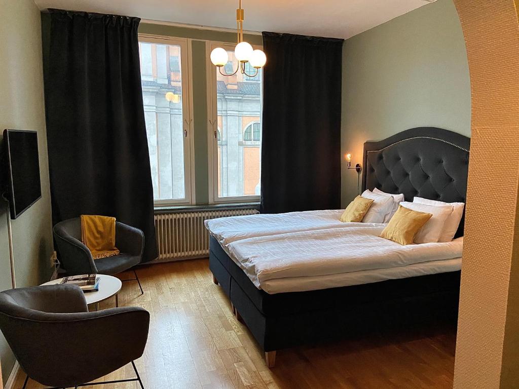 Двухместный (Улучшенный двухместный номер с 1 кроватью или 2 отдельными кроватями) отеля First Hotel Statt, Карлскруна