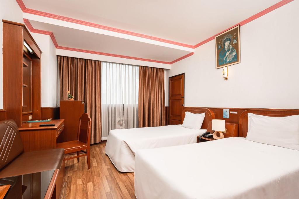 Двухместный (Улучшенный двухместный номер с 2 отдельными кроватями) отеля Elizabeth, Бангкок