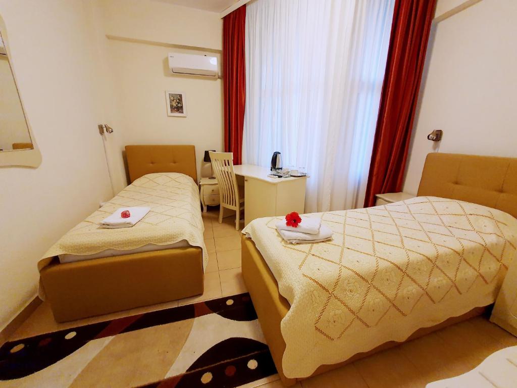 Двухместный (Двухместный номер с 2 отдельными кроватями) отеля Hotel Florentina, Констанца