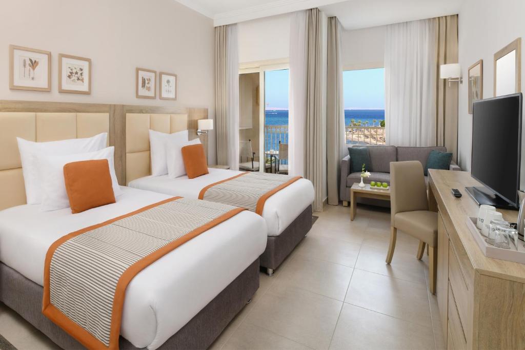 Двухместный (Улучшенный номер с 2 отдельными кроватями, вид на море) курортного отеля Grand Plaza Hotel Hurghada, Хургада