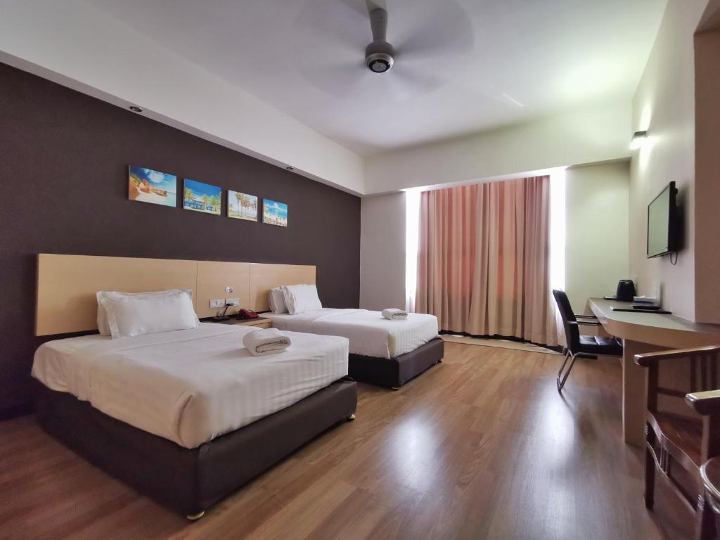 Двухместный (Двухместный номер Делюкс с 1 кроватью или 2 отдельными кроватями) отеля Hotel Langkasuka Langkawi, Лангкави