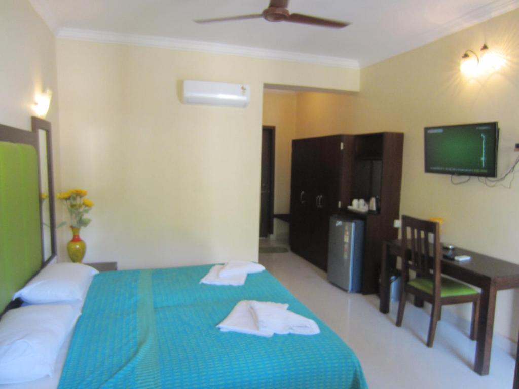 Двухместный (Двухместный номер Делюкс с 1 кроватью или 2 отдельными кроватями и видом на бассейн) курортного отеля Riverside Regency Resort, Бага