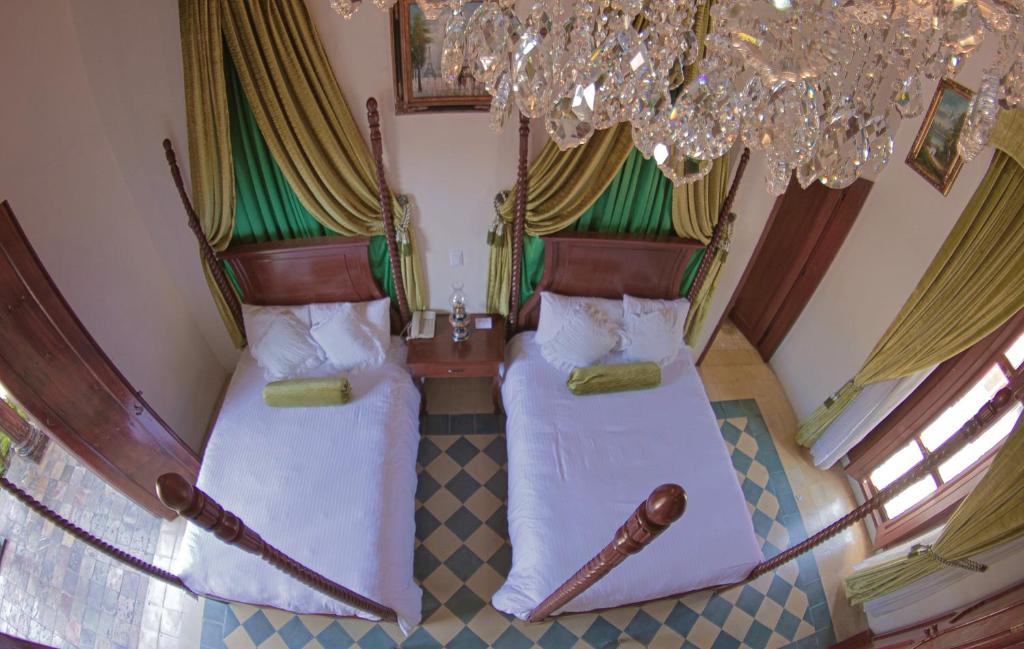 Двухместный (Двухместный номер с 2 двуспальными кроватями) отеля La Casa Del Marques de Comillas, Комитан-де-Домингес