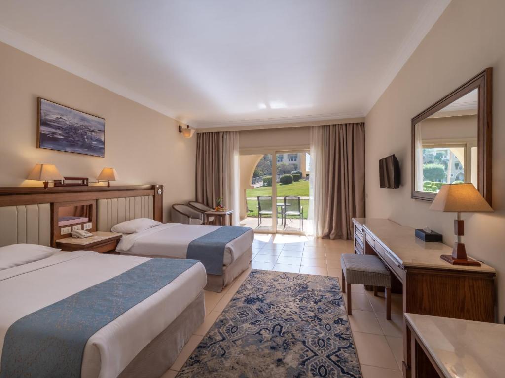 Двухместный (Стандартный двухместный номер с 1 кроватью, вид на сад и бассейн) курортного отеля Serenity Makadi Beach, Хургада
