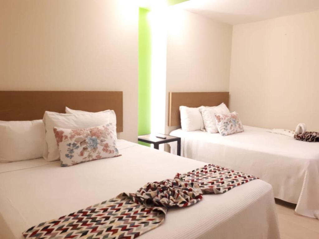 Двухместный (Номер с 2 двуспальными кроватями) апартамента Brisas 10 - Condos and Rooms, Канкун
