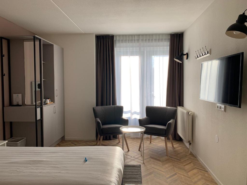 Двухместный (Небольшой двухместный номер с 1 кроватью) отеля Hotel In den Brouwery, Домбург