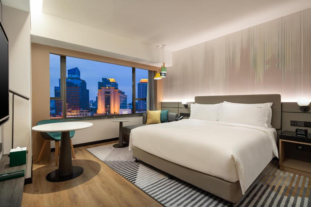 Двухместный (King Room with Holiday View) отеля Guxiang Hotel Shanghai, Шанхай