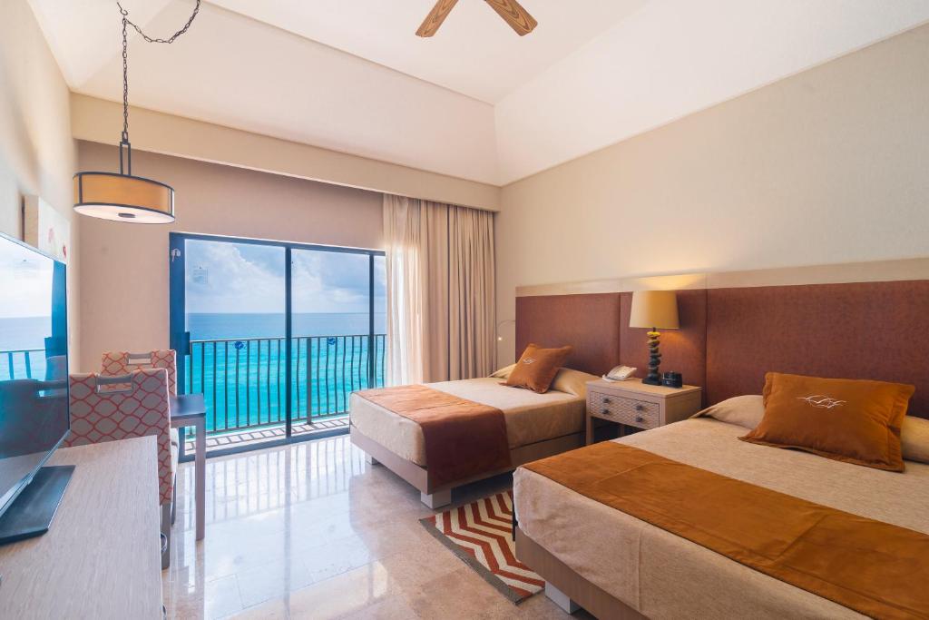 Сьюит (Полулюкс с видом на пляж) курортного отеля The Royal Sands - Все включено, Канкун
