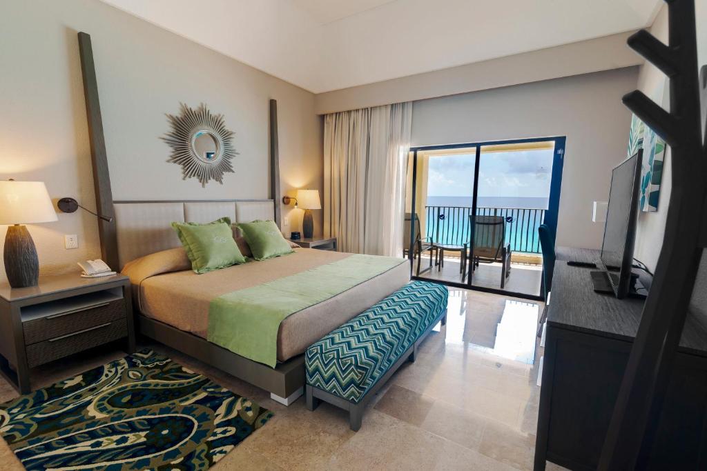 Вилла (Суперлюкс «Мастер» с 2 спальнями, рядом с пляжем (для 2 взрослых и 2 детей)) курортного отеля The Royal Sands - Все включено, Канкун