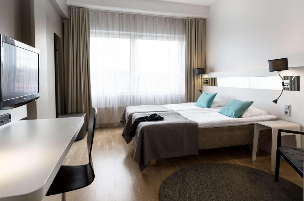 Двухместный (Стандартный двухместный номер с 2 отдельными кроватями) отеля Scandic Julia, Турку