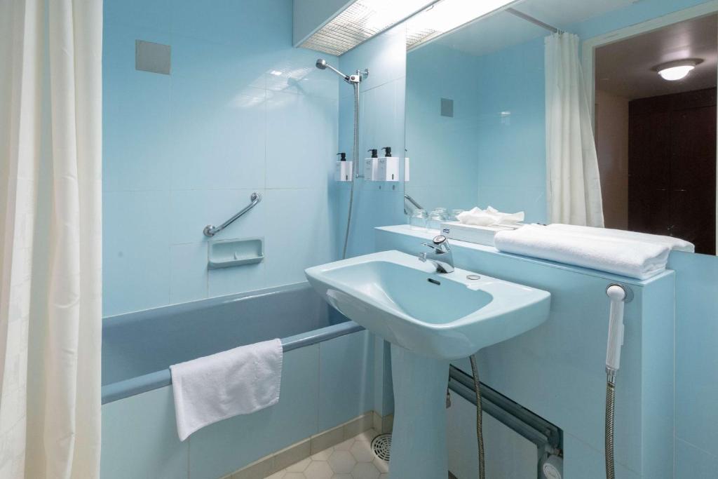 Двухместный (Улучшенный двухместный номер с 2 отдельными кроватями — в здании замка) отеля Cumulus Resort Imatran Valtionhotelli, Иматра