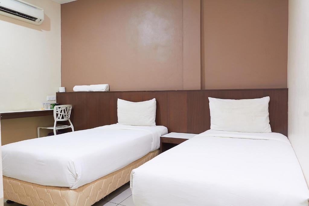 Двухместный (Стандартный двухместный номер с 2 отдельными кроватями) отеля Langkawi Uptown Hotel, Лангкави