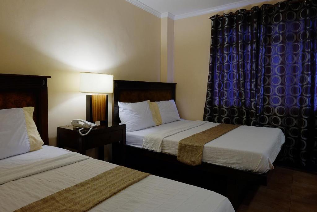 Двухместный (Представительский двухместный номер с 2 отдельными кроватями) отеля Palazzo Pensionne, Себу