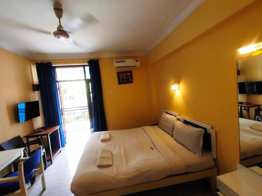 Двухместный (Двухместный номер Делюкс с 1 кроватью или 2 отдельными кроватями) отеля Royal Heritage Calangute, Калангут