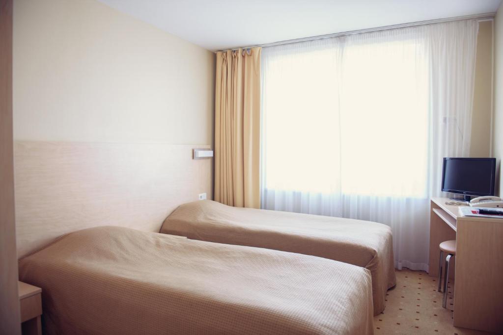 Двухместный (Стандартный двухместный номер с 1 кроватью или 2 отдельными кроватями) отеля Park Hotel Latgola, Даугавпилс