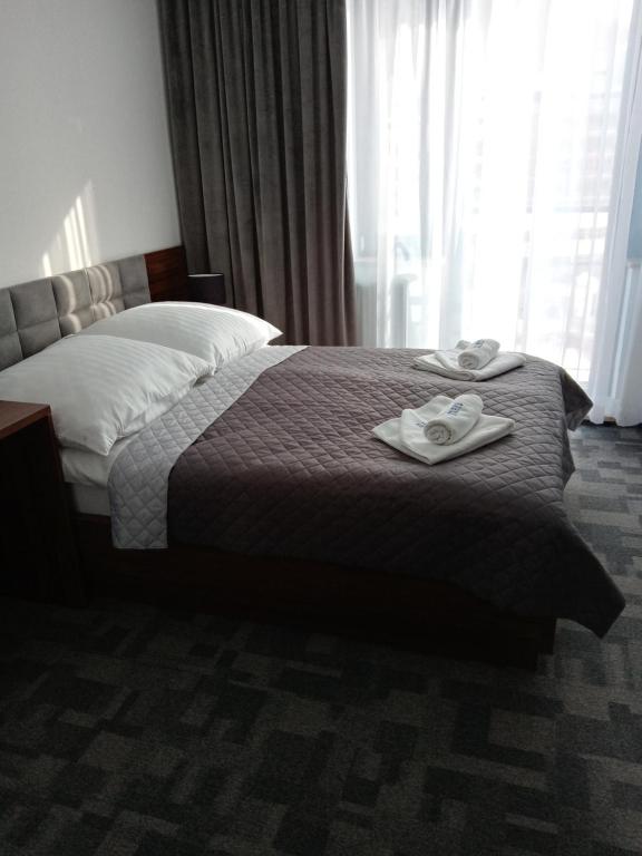 Двухместный (Улучшенный двухместный номер с 2 отдельными кроватями) курортного отеля OWS Farys, Крыница