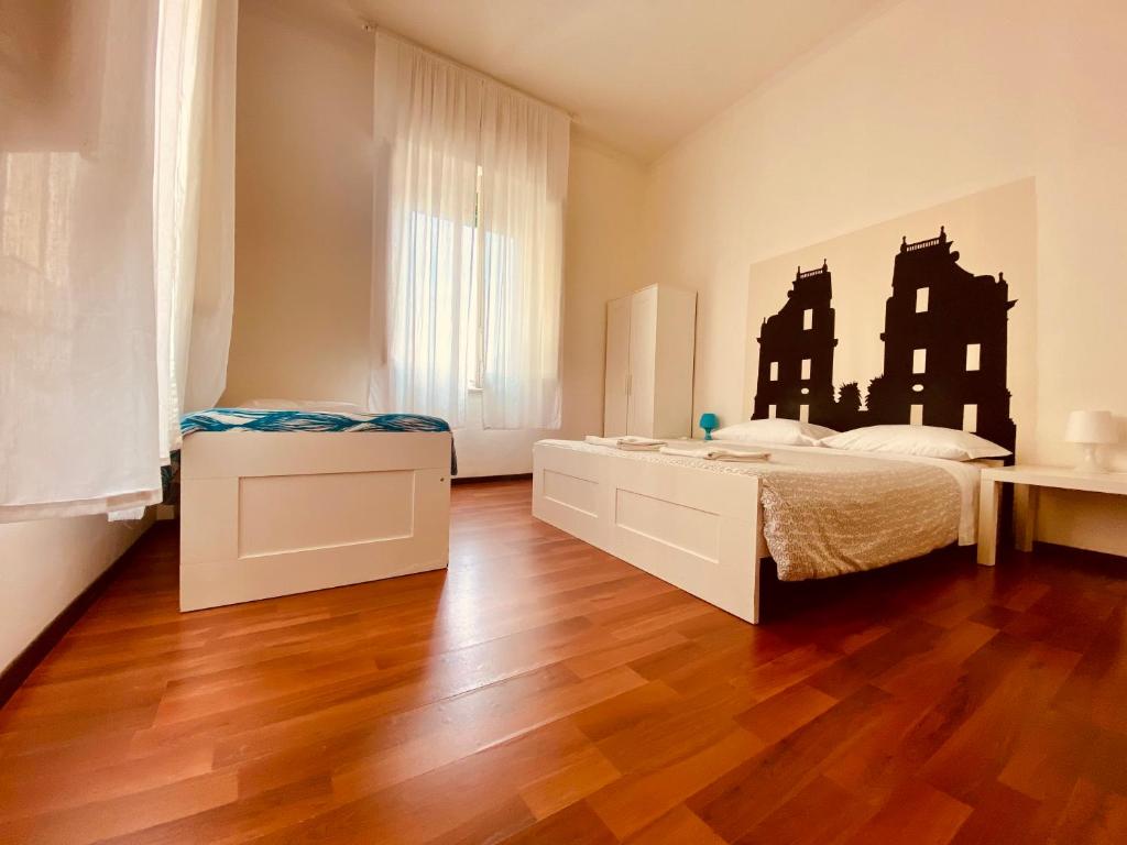 Двухместный (Двухместный номер с 2 отдельными кроватями и общей ванной комнатой) гостевого дома Castelnuovo Rooms, Палермо