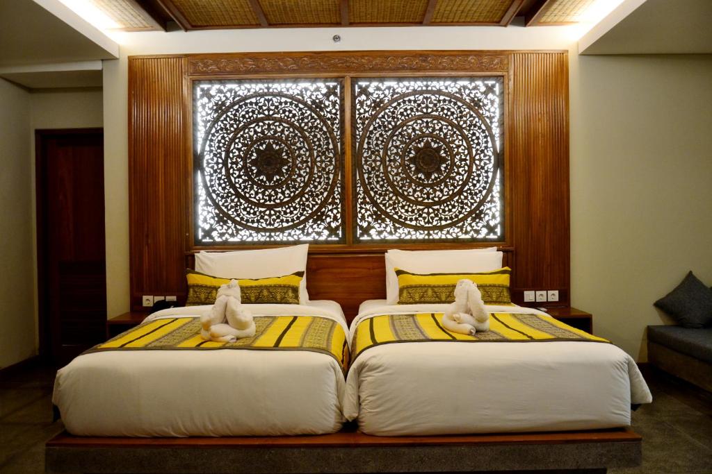 Двухместный (Двухместный люкс Kenran с 2 отдельными кроватями) курортного отеля Kenran Resort Ubud By Soscomma, Убуд