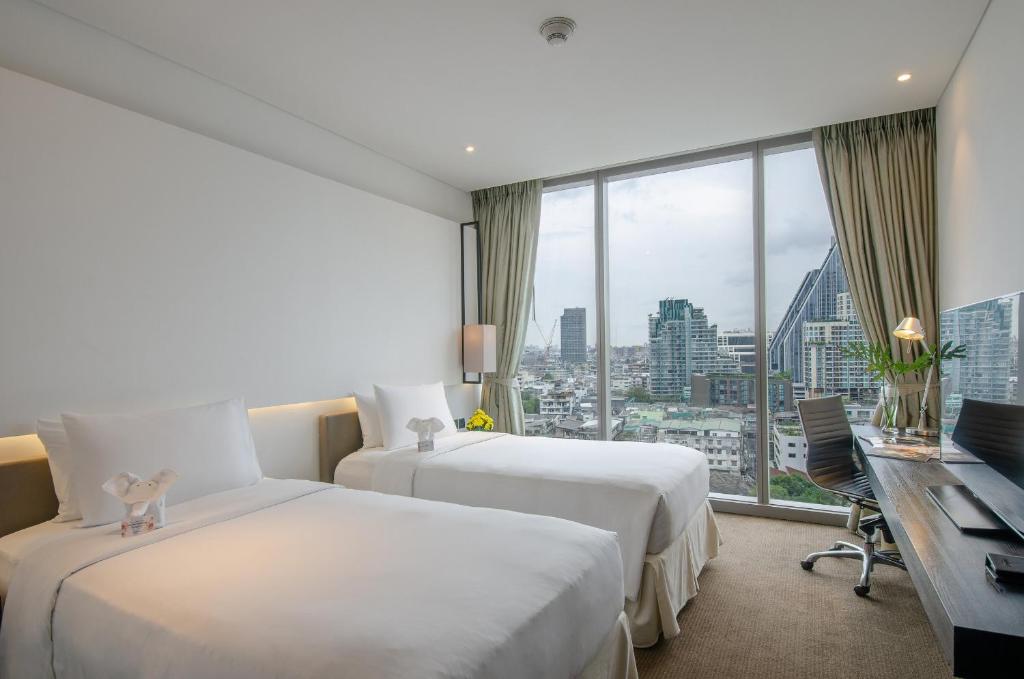 Двухместный (Двухместный номер Делюкс с 2 отдельными кроватями (без сертификации ASQ)) отеля Amara Bangkok, Бангкок