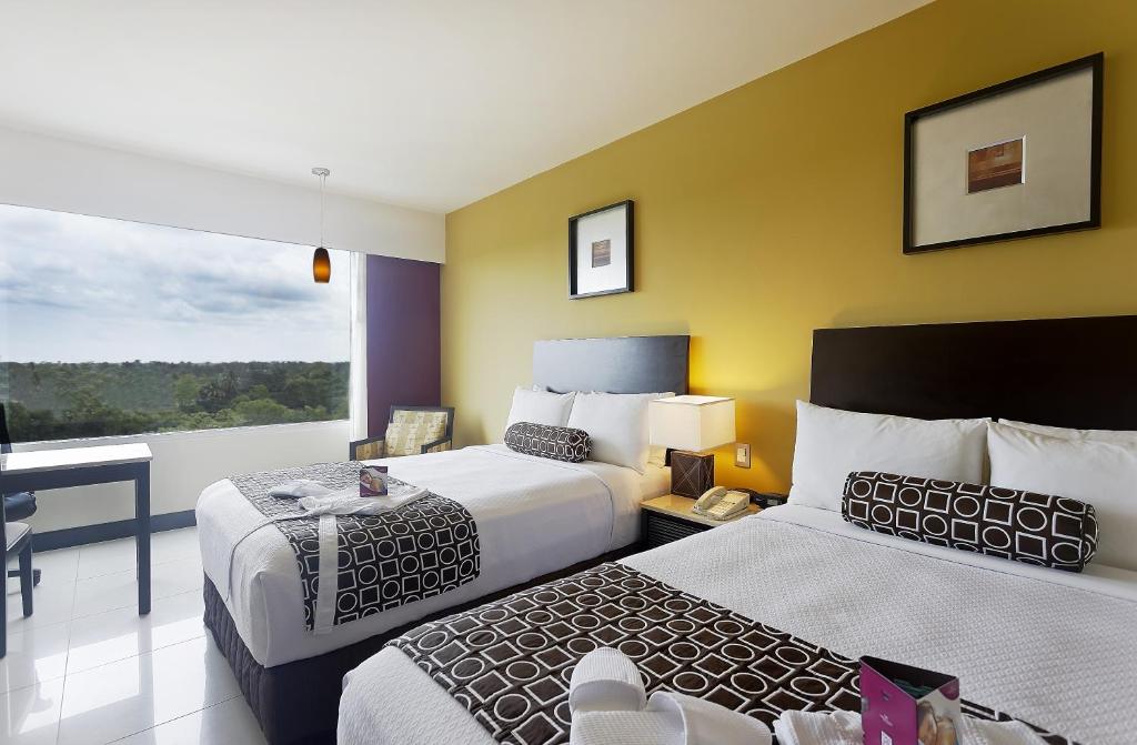 Двухместный (Представительский двухместный номер с 2 отдельными кроватями) отеля Crowne Plaza Villahermosa, Вильяэрмоса