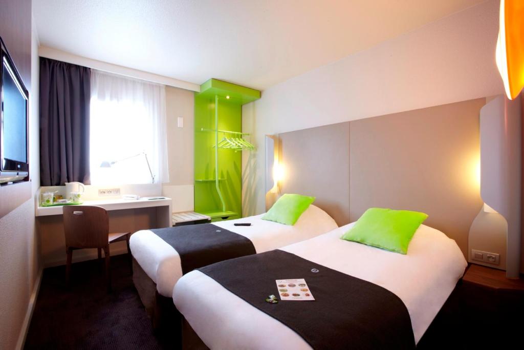Двухместный (Улучшенный двухместный номер с 2 отдельными кроватями) отеля Campanile Lille Euralille, Лилль