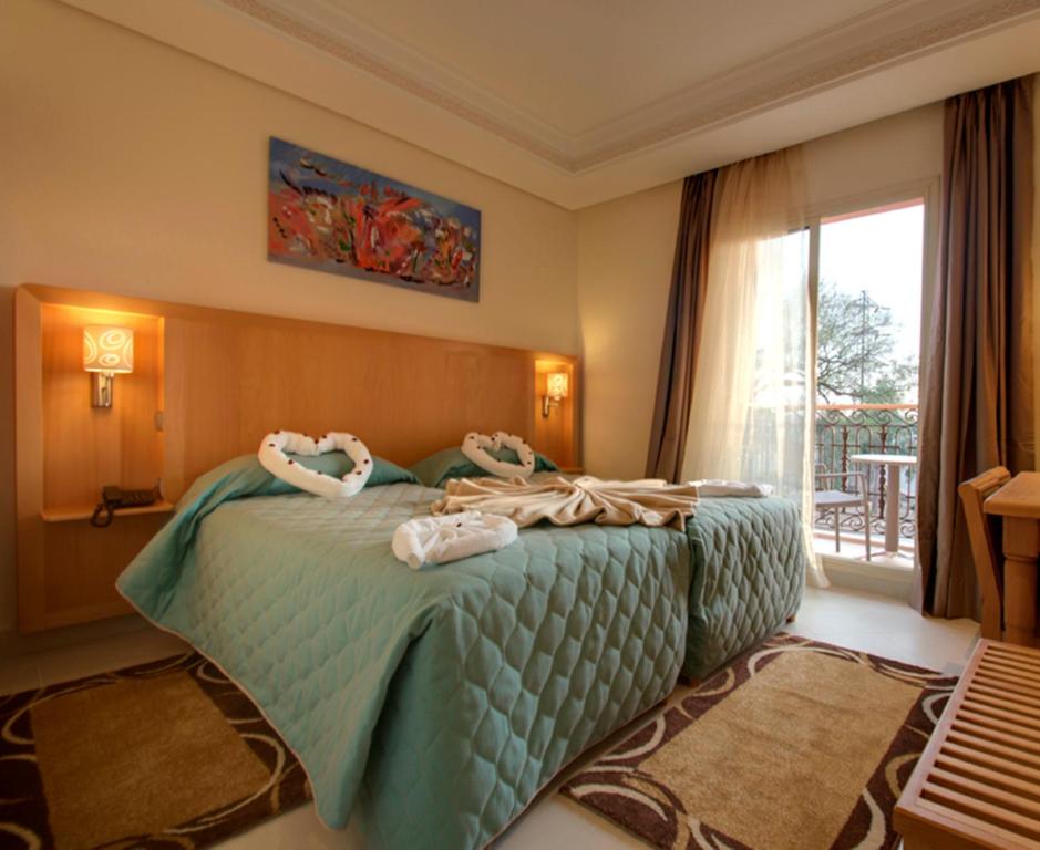 Двухместный (Стандартный двухместный номер с 2 отдельными кроватями) отеля Hotel Palais Al Bahja, Марракеш