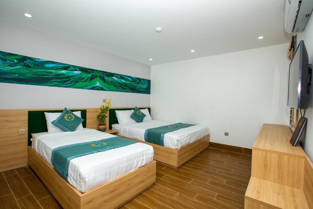 Двухместный (Двухместный номер Делюкс с 2 отдельными кроватями) отеля Emerald Hotel Cát Bà, Катба