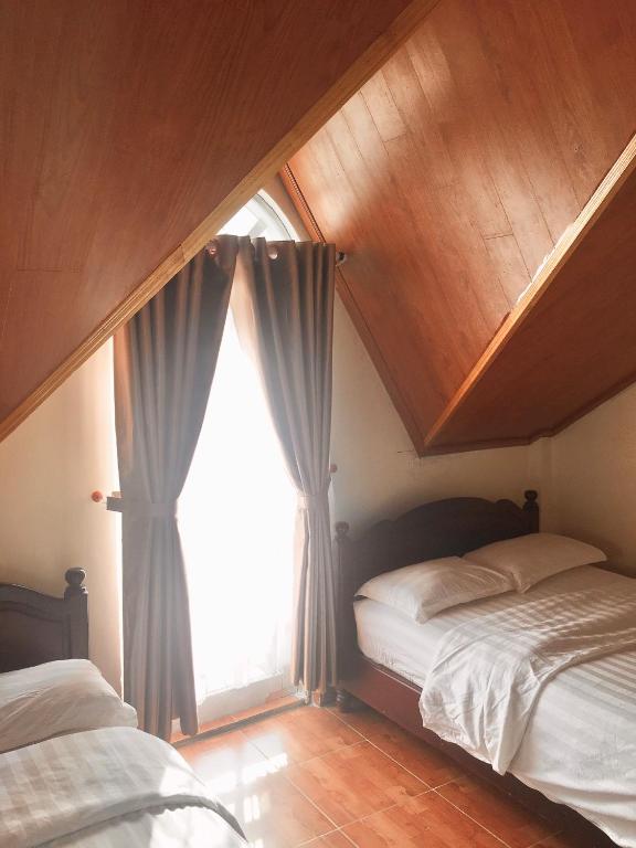 Двухместный (Двухместный номер с 2 отдельными кроватями и видом на город) отеля Tuyet Mai Hotel, Далат