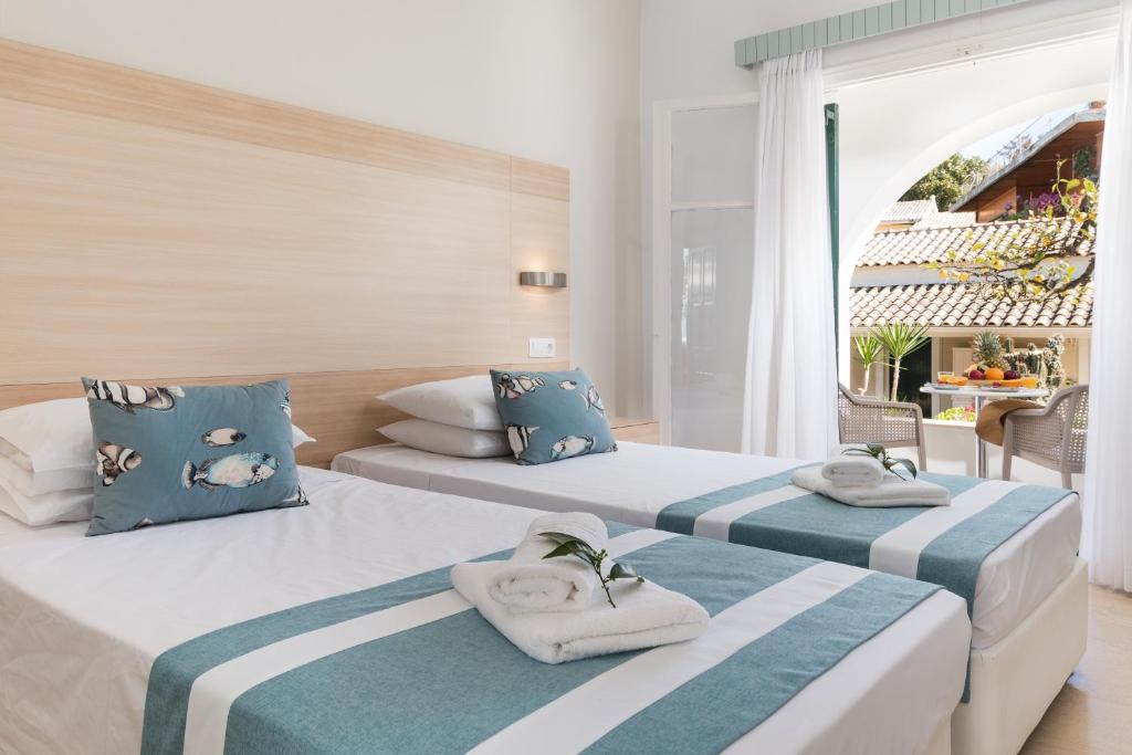 Двухместный (Двухместный номер с 1 кроватью или 2 отдельными кроватями и дополнительной кроватью) отеля Iliada Beach Hotel, Гоувия